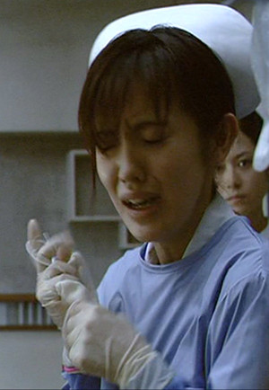 感染の映画で真木よう子が映り込み