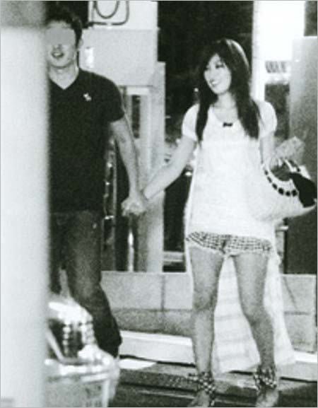 熊田曜子と夫のツーショット写真2枚目